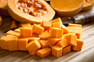 A close-up of a pumpkin with text "Pumpkin Extract: Nature's Gift.