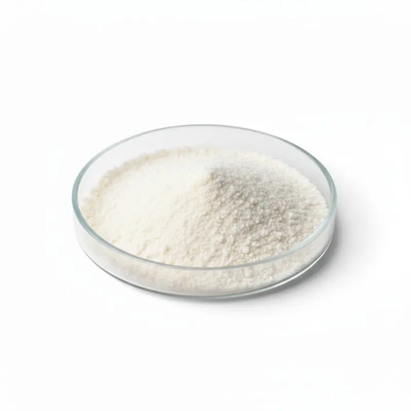 White powder in a glass dish on white background.