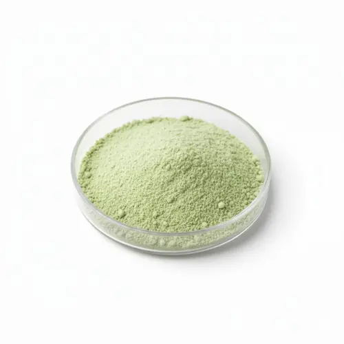 Green powder in a glass dish for research.
