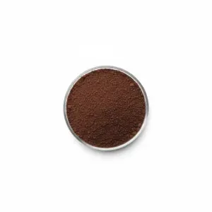 Top view of ground coffee in bowl.