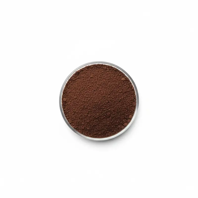 Top view of ground coffee in bowl.