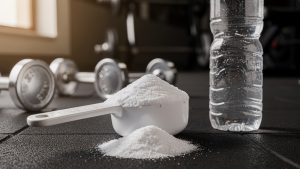 Workout supplements and water bottle at gym