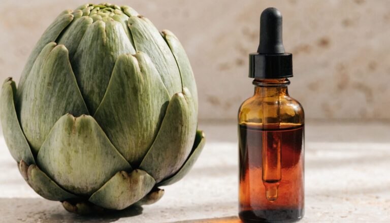 Fresh artichoke beside a concentrated extract bottle