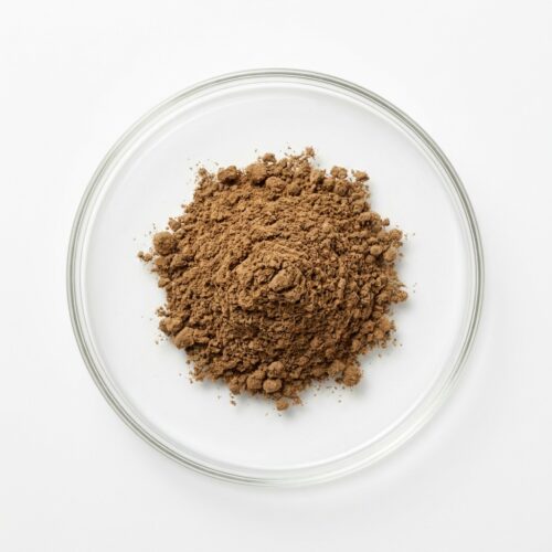 burdock-root-extract-powder Brown burdock root extract powder in a glass petri dish
