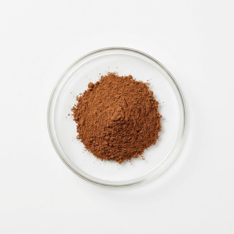 cordyceps-extract-powder Brown cordyceps mushroom extract powder in a glass petri dish