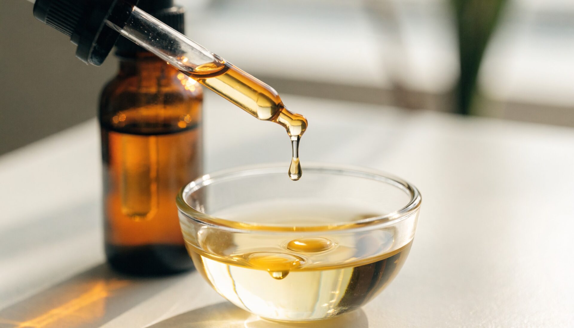 Essential oil blended with carrier oil in an amber dropper bottle