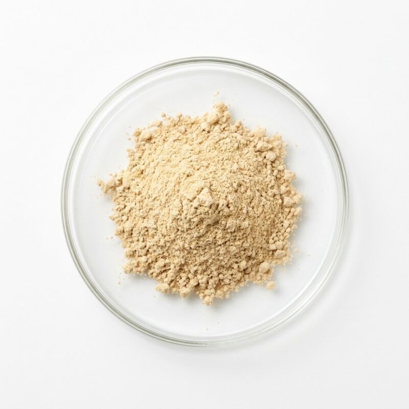 ginger-root-extract-powder Light tan ginger root extract powder in a glass petri dish