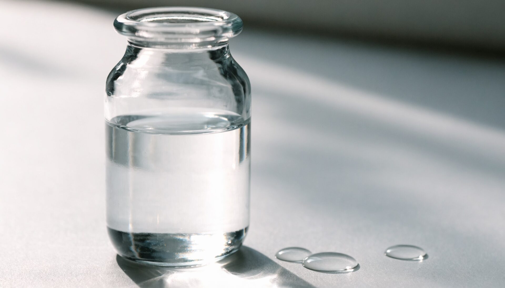 Clear glycerin liquid in a glass bottle