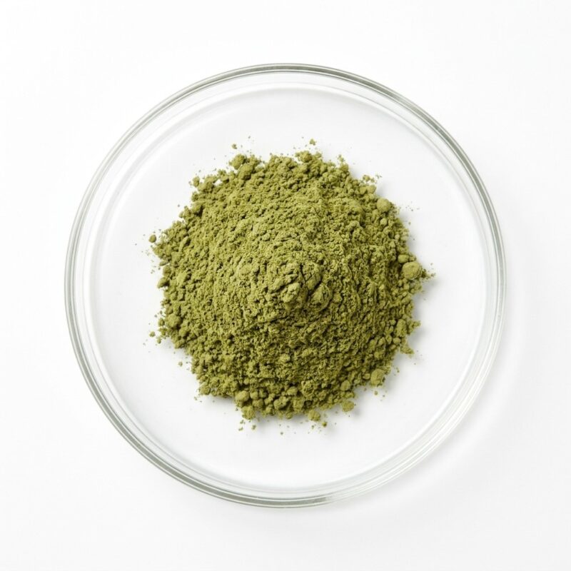 gotu-kola-extract-powder Green gotu kola leaf extract powder in a glass petri dish
