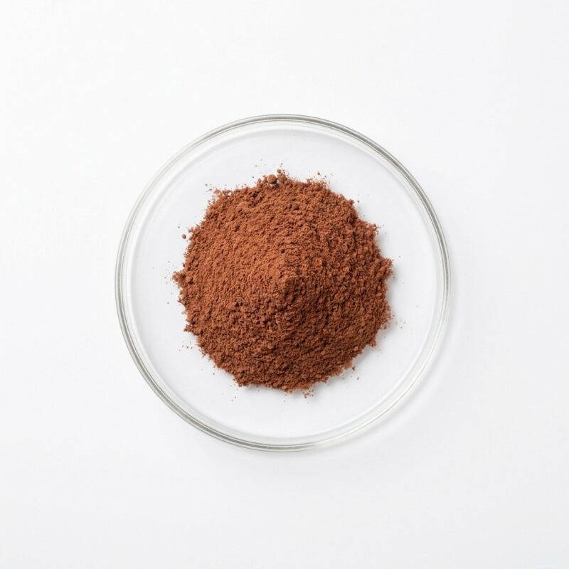 grape-seed-extract-powder Reddish-brown grape seed extract powder in a glass petri dish