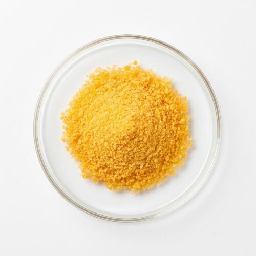 PSD Orange - Natural Orange Juice Powder Vibrant orange juice powder in a glass petri dish