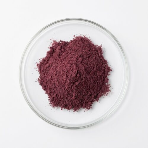Sour Plum Powder - Natural Sweet-Sour Flavoring Dark plum fruit powder in a glass petri dish