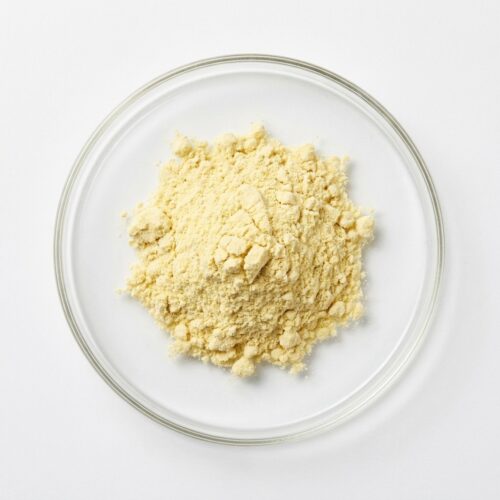 lemon-psd-spray-dried Pale yellow lemon PSD juice powder in a glass petri dish