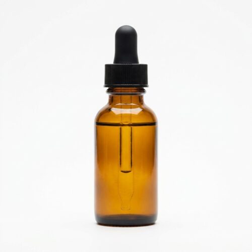 moringa-oil Amber moringa oil in a glass bottle