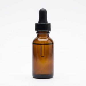 Essential oil in an amber dropper bottle