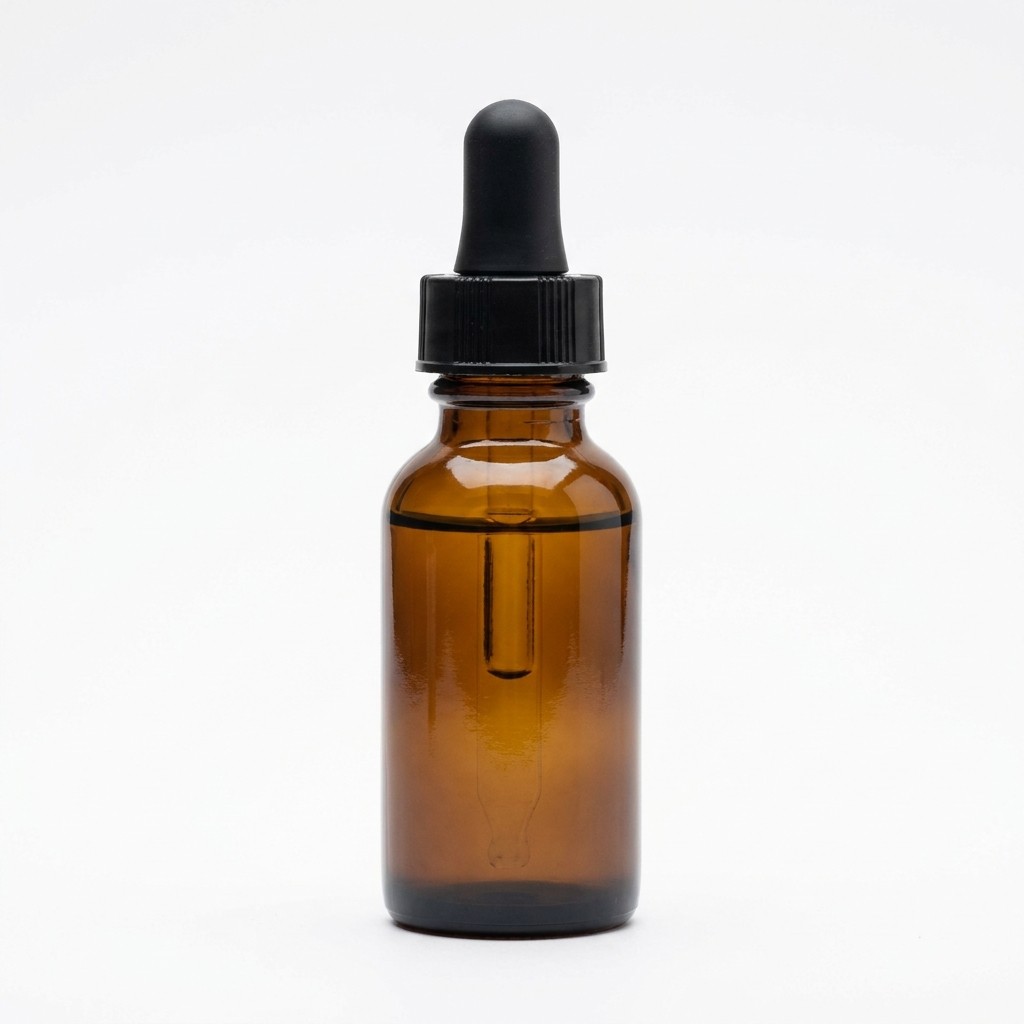 Essential oil in an amber dropper bottle