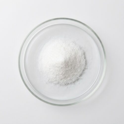 sodium-citrate-powder Fine white sodium citrate powder in a glass petri dish