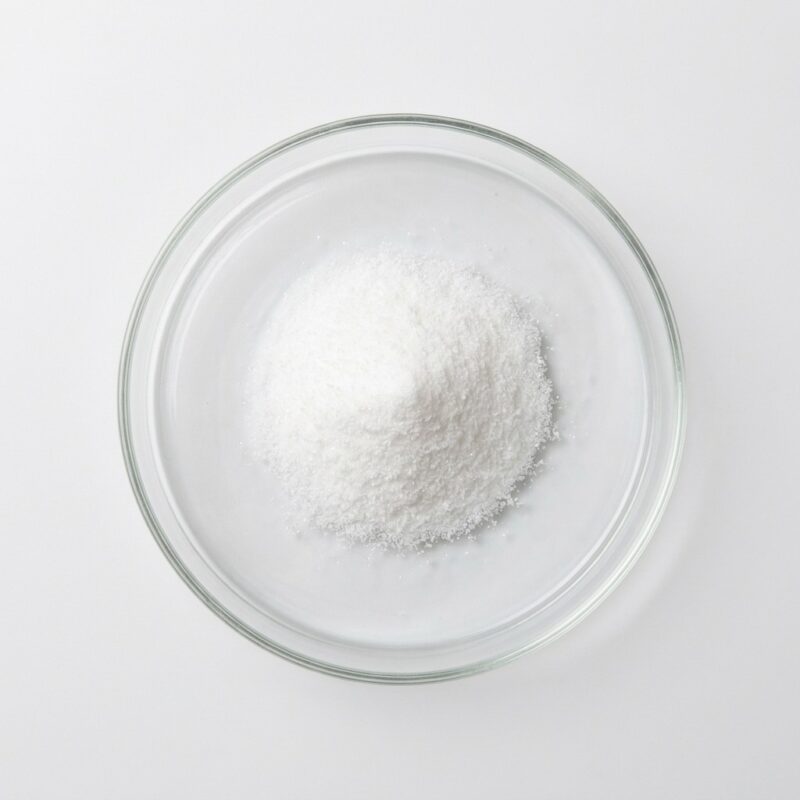 sodium-citrate-powder Fine white sodium citrate powder in a glass petri dish