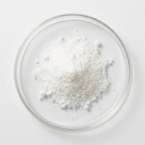 taurine-powder Fine white taurine crystalline powder in a glass petri dish