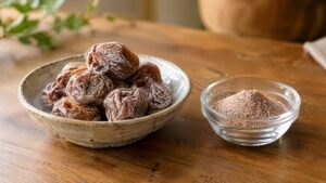 Dried salted plums beside salted plum powder